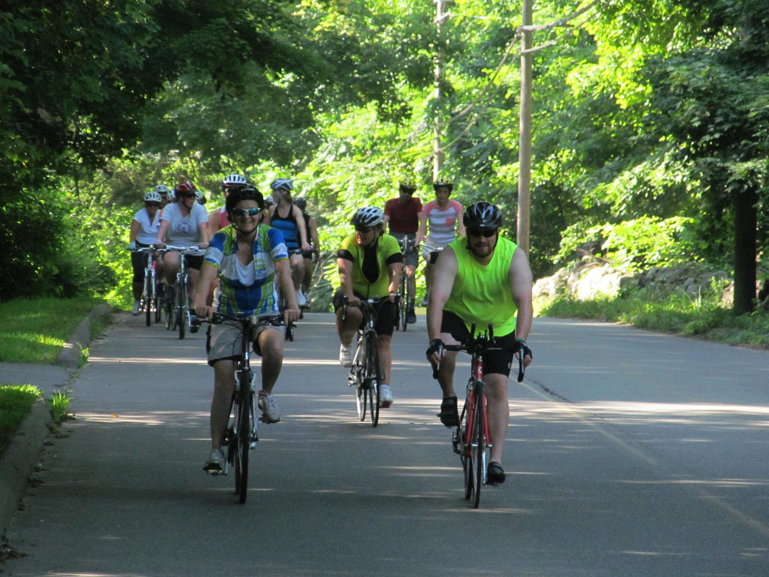 Staying cool, cyclists on the way to Lake Quonnipaug on a Shoreline Greenway Trail's First Saturday Bike and Hike, July 6