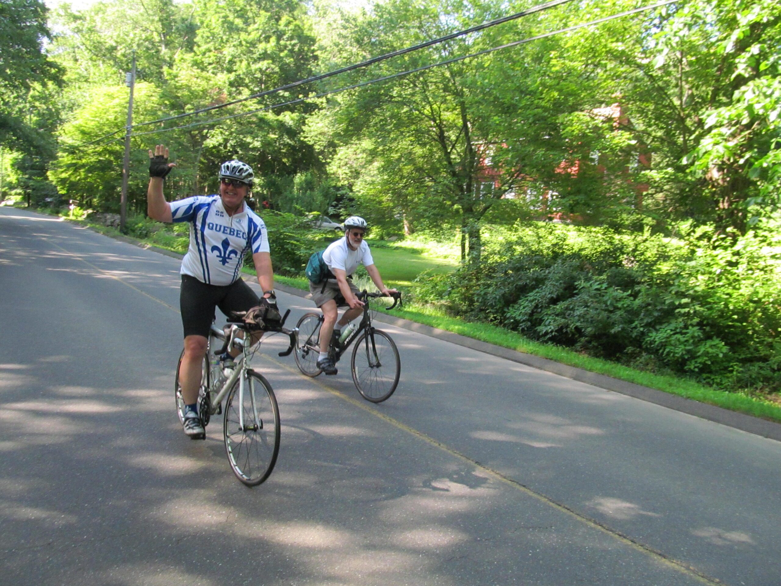 An open road for Shoreline Greenway Trail leader Terry Maguire and friend, on the way to Lake Quonnipaug