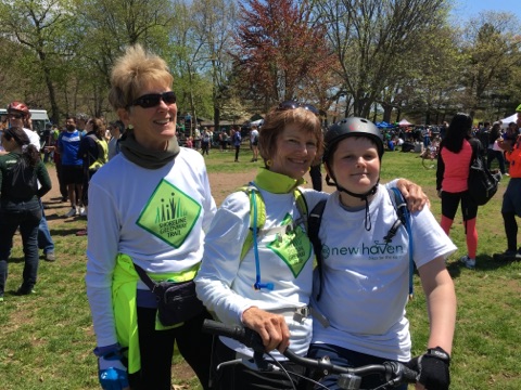 SGT's Pam Bisbee-Simonds, Carol Grave and Carol's grandson Denali celebrate completing the Rock to Rock ride.
